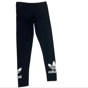 Adidas leggings with trefoil detailing on leg size S